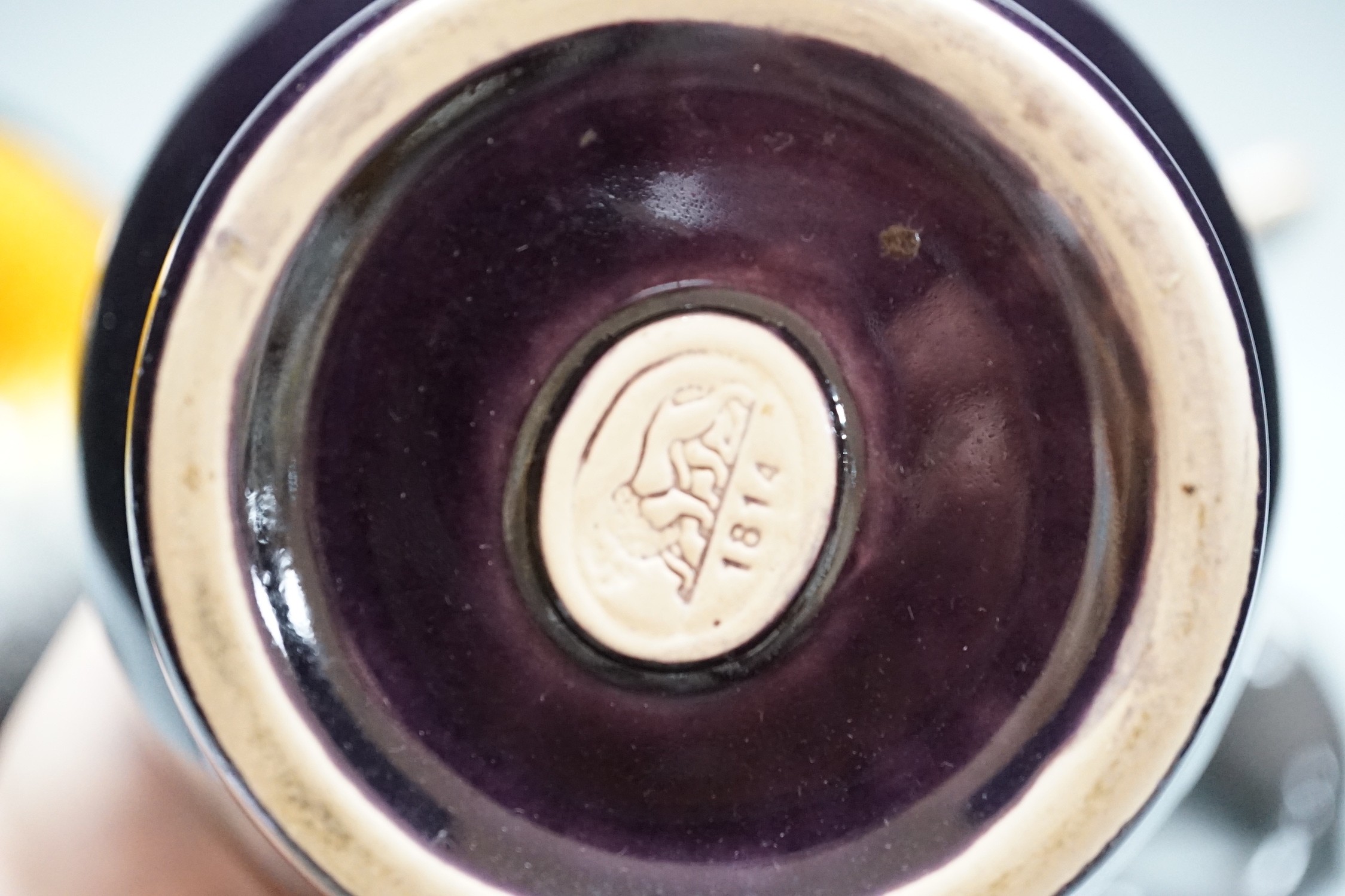 A Copenhagen porcelain seal, a Canadian pottery bull and two German vases tallest 21.5cm